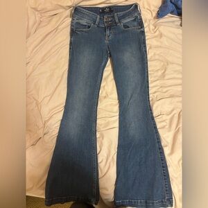 hollister medium wash low rise flared jeans